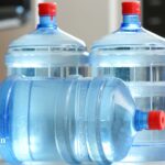 how much does a 5 gallon bottle of water weigh