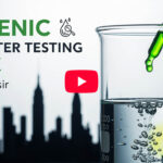 Arsenic in Water Testing NYC by Dr. Yasir. Beaker with water sample and dropper for water quality analysis.