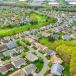 Aerial view of Middlesex County homes near green spaces. Water quality concerns past to present.