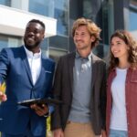 Real estate agent shows a house with a well to a young couple. PWTA knowledge for realtors.