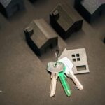 Keys and house models. Disclosing well water issues during a home sale. Real estate.