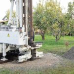 Well water equipment. Drilling rig for well water testing, treatment, and filtration systems. Sizing based on lab results.