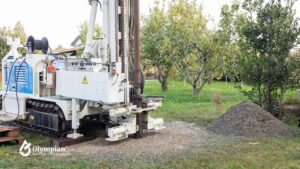 Well water equipment. Drilling rig for well water testing, treatment, and filtration systems. Sizing based on lab results.